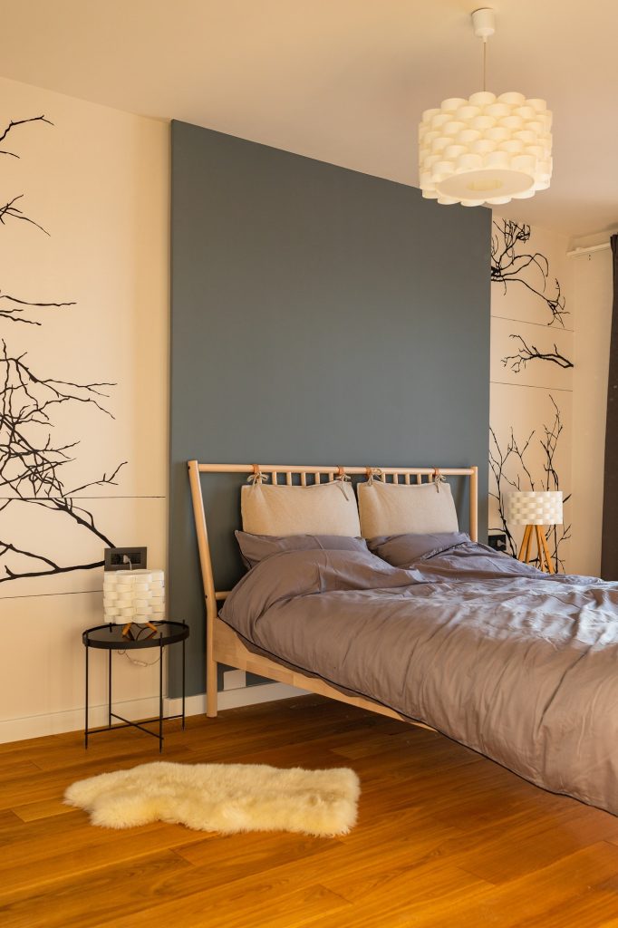 Master bedroom with paintings on the wall