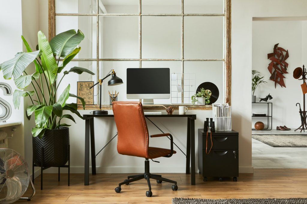 Stylish composition of modern masculine home office workspace interior design