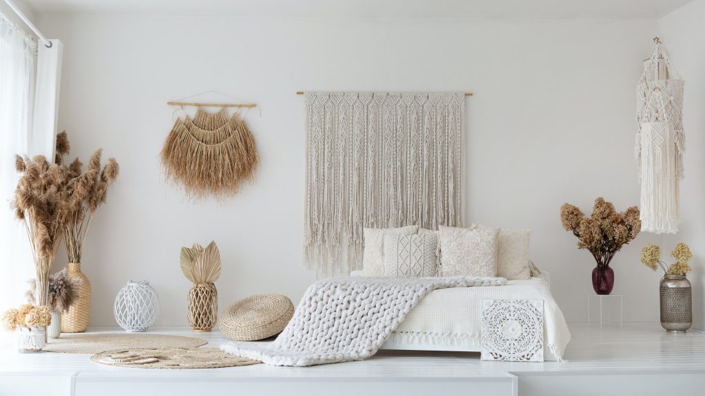 White ethnic bedroom design with comfortable bed and window